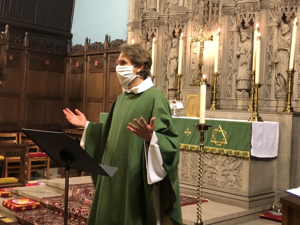 Adam Trambley at St. John's Episcopal Church preaching with mask August 2020